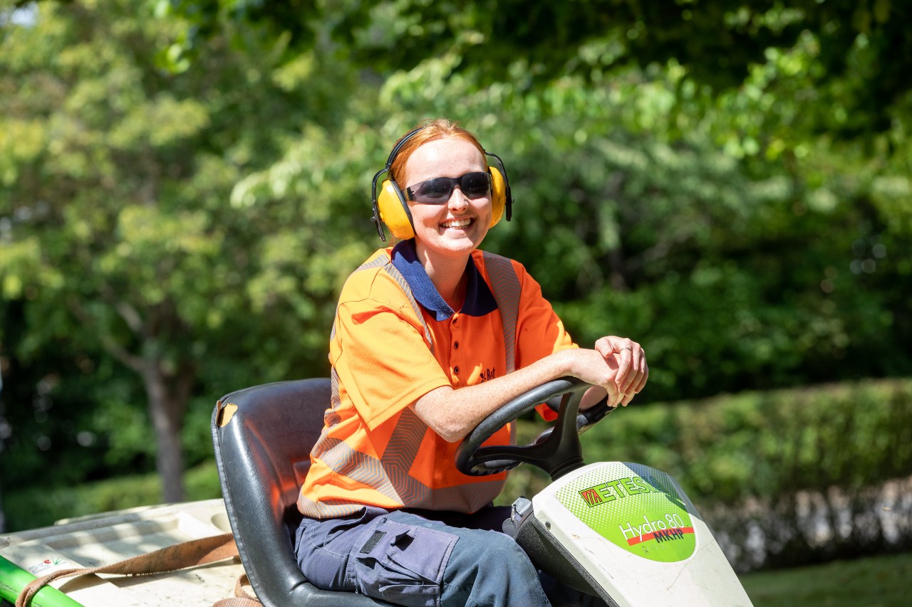 Women on mower